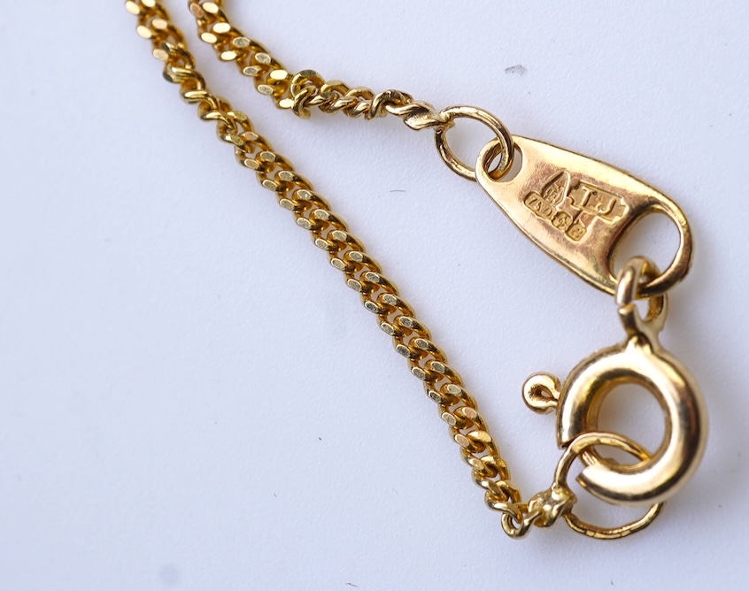 A ruby and diamond pendant